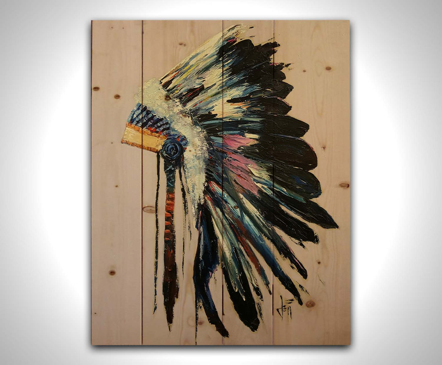 A painting of a feather headdress with vibrant colors and thick paint application, on a dusty backgound. Printed on a wood pallet.