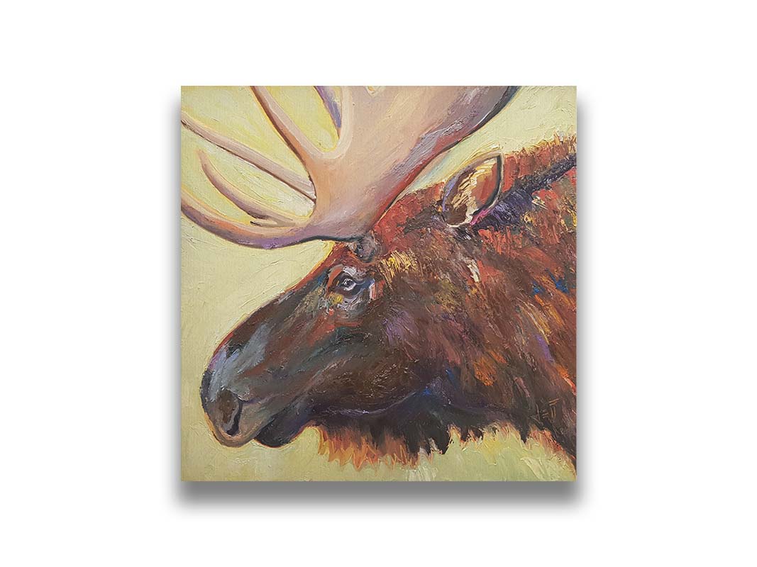 An expressive painting of a moose's face against a pale yellow background. Printed on canvas.