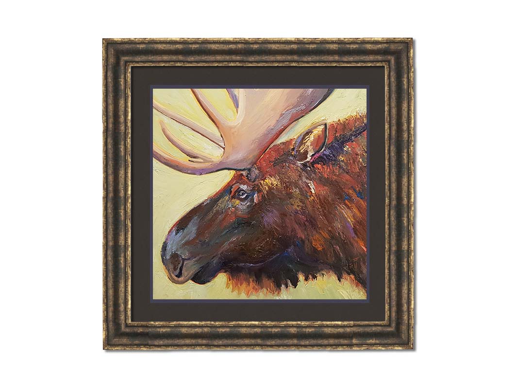 An expressive painting of a moose's face against a pale yellow background. Printed on paper, matted, and framed.