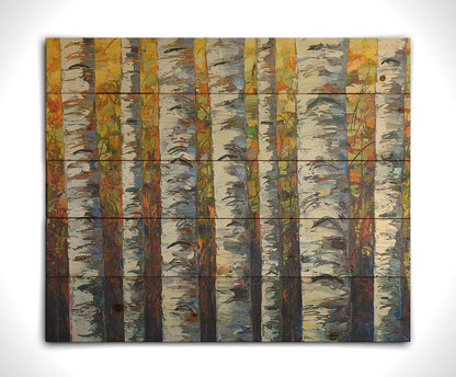 A painting of a birch forest, close up on the white trunks on a background of yellow, orange, and green leaves. Printed on a wood pallet.