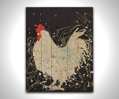 A drip painting of a white rooster on a black background, accented with blue, red, and yellow. Printed on a wood pallet.