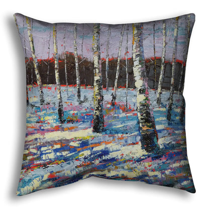 Throw pillow printed with an abstract painting of birch trees in a snowy landscape.