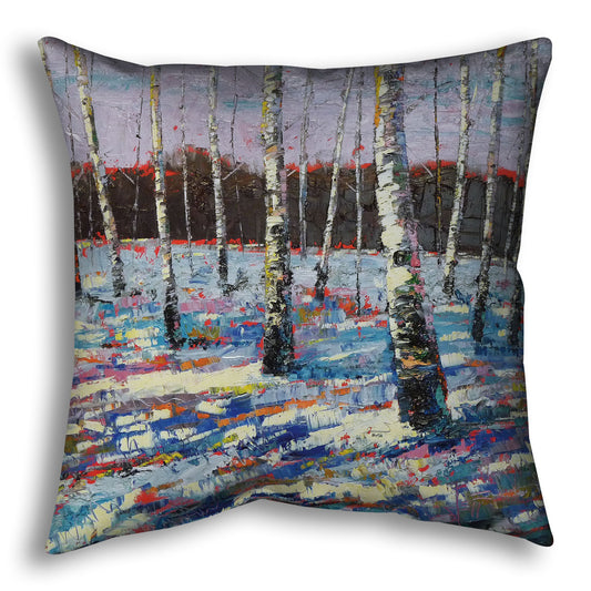Throw pillow printed with an abstract painting of birch trees in a snowy landscape.