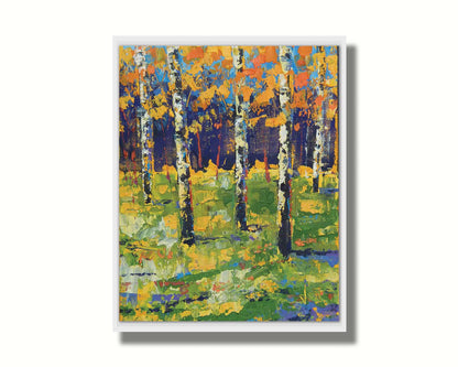 A painting of a birch forest in autumn, the yellow and orange tree leaves contrasted against a purple and blue forest and sky. Printed on canvas in a float frame.