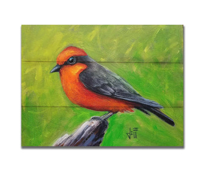 A painting of a vermilion flycatcher bird, with red and black feathers, perched on a piece of wood before a green background. Printed on a box board.