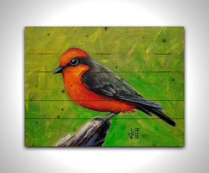 A painting of a vermilion flycatcher bird, with red and black feathers, perched on a piece of wood before a green background. Printed on a wood pallet.