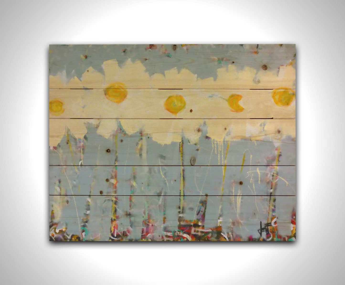 A painting of a row of pale yellow flowers against a pale blue background. Printed on a wood pallet.