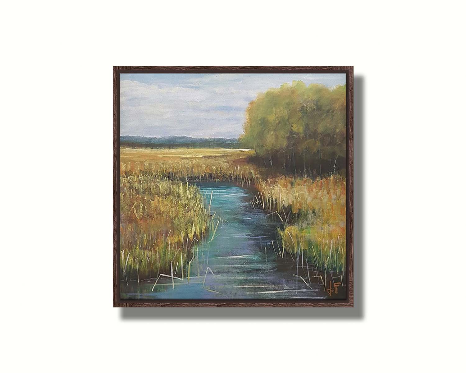 A painting of a stream running through fields of yellow grasses, with clusters of trees to one side. Printed on canvas in a float frame.