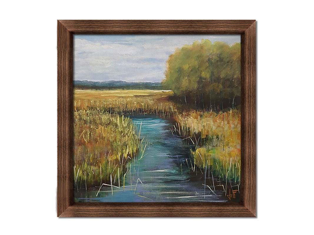 A painting of a stream running thorugh fields of yellow grasses, with clusters of trees to one side. Printed on canvas and framed.