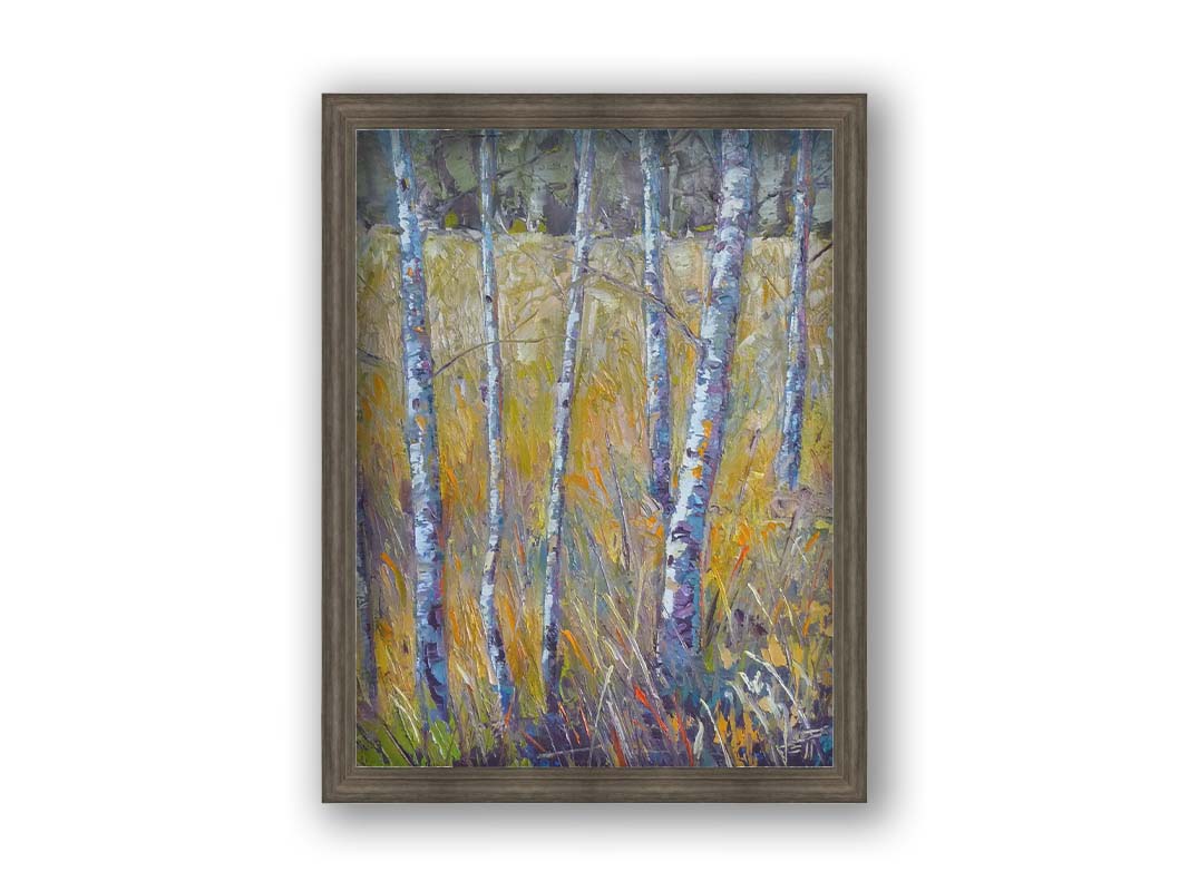 A painting of birch trunks growing surrounded by yellow grasses of fall. Printed on canvas and framed.