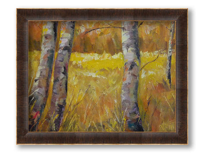 A painting of gray tree trunks among golden yellow grass. The forest in the distance have orange leaves for fall. Printed on canvas and framed.