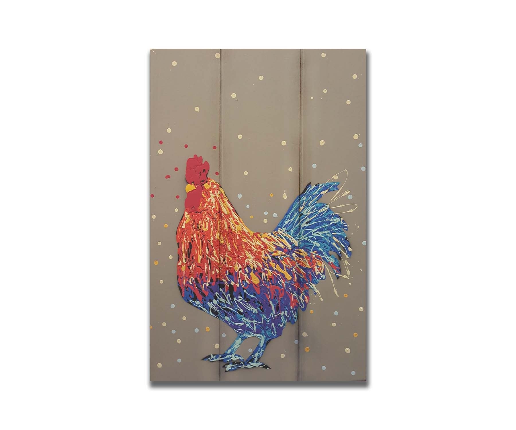 A drip painting of a red and blue rooster against a warm gray background. Printed on a box board.