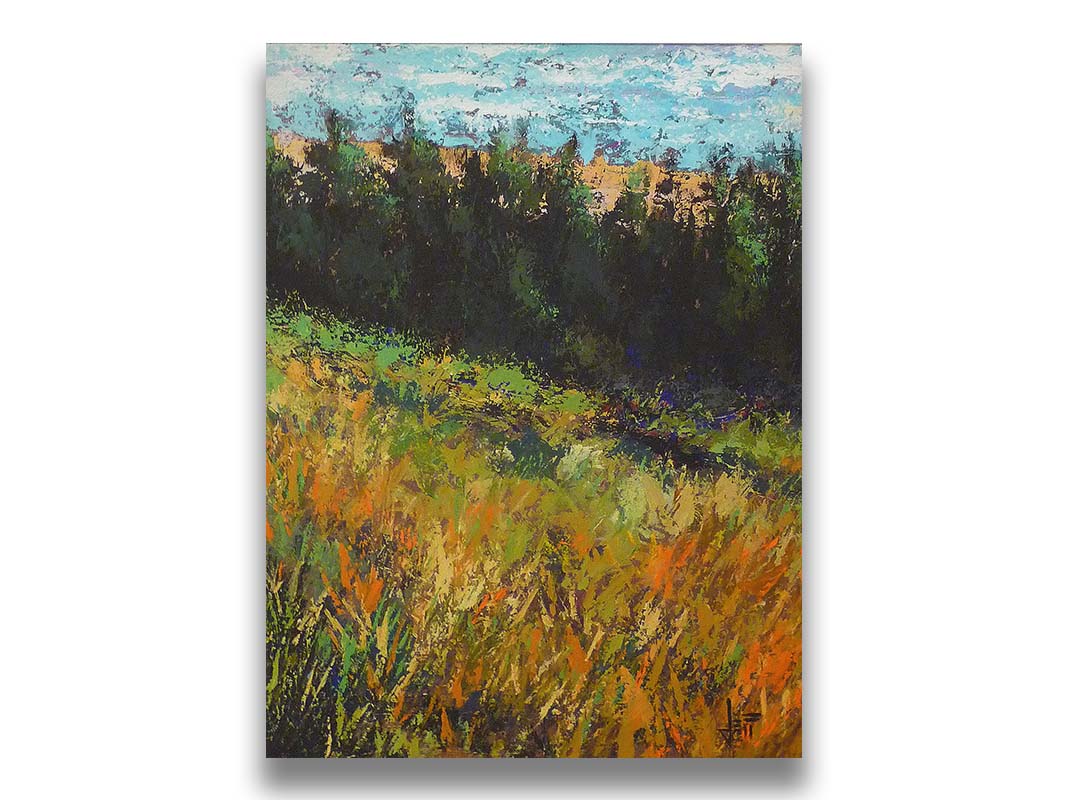 A painting of a grassy green and orange hill, lined in the distance by evergreen trees. Printed on canvas.