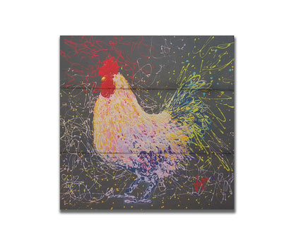 A drip painting of a rooster using a wide variety of layered colors, sharply contrasted against a gray background. Printed on a box board.