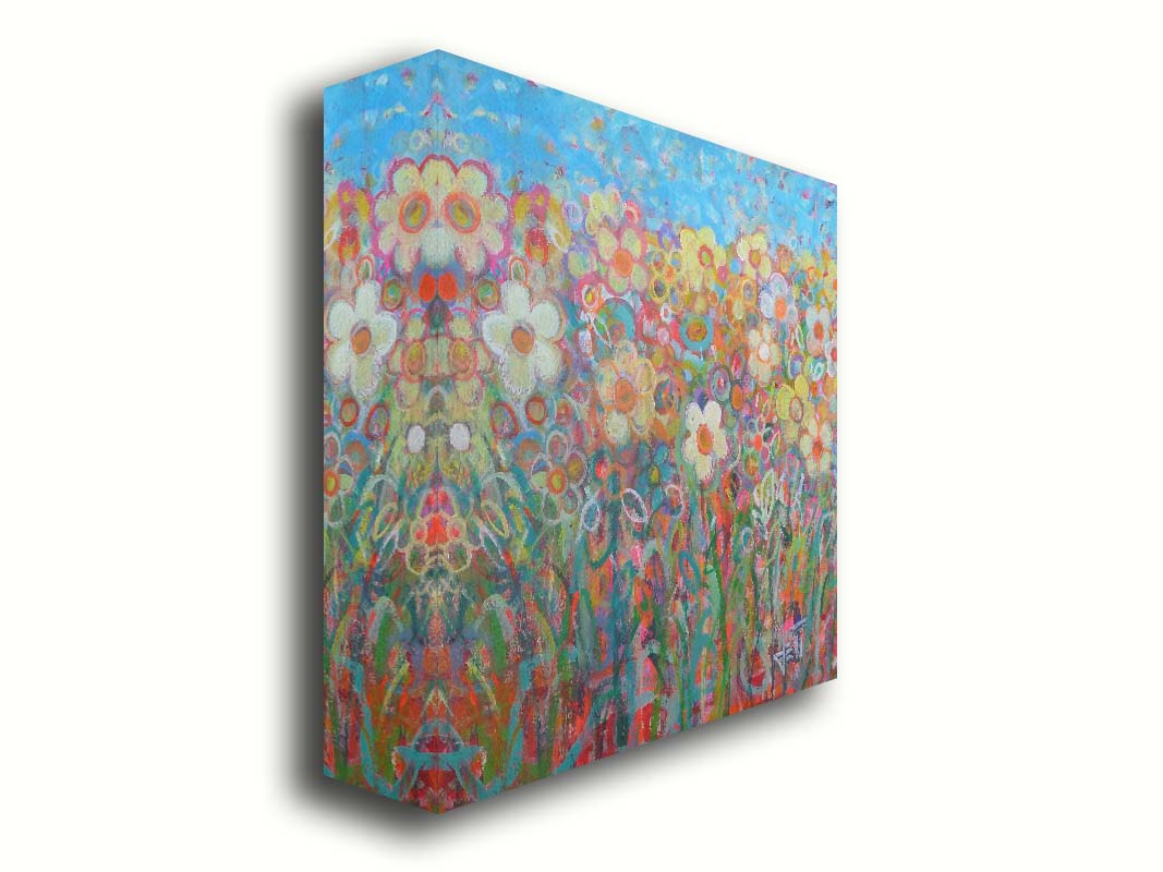 A painting of a simplified field of flowers in a variety of colors, set against a bright blue sky. Printed on canvas.