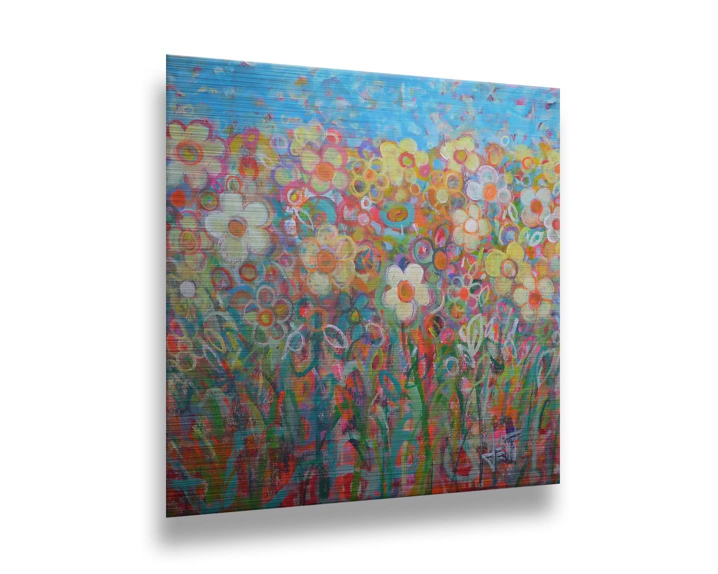 A painting of a simplified field of flowers in a variety of colors, set against a bright blue sky. Printed on metal.