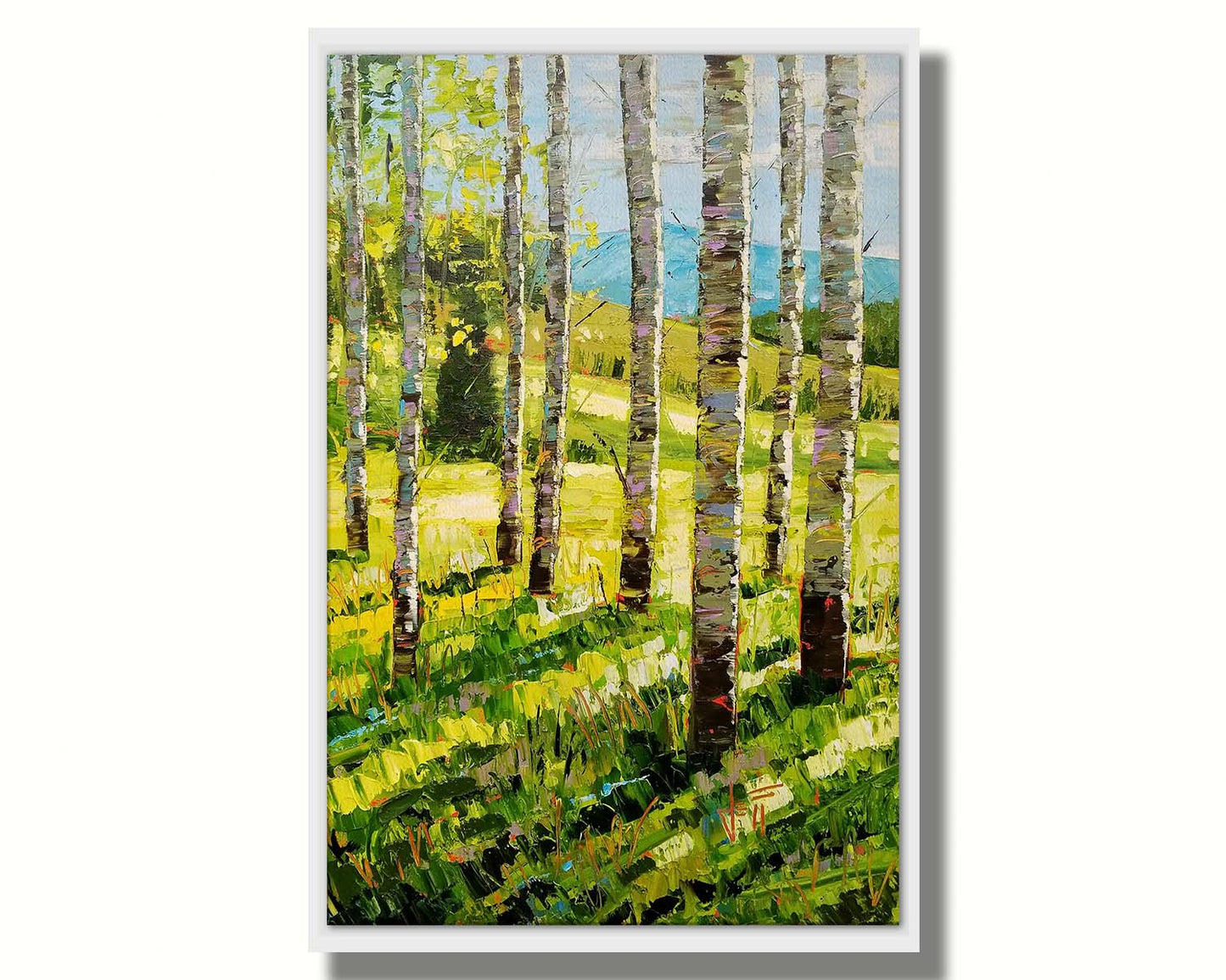 A painting of a group of birch tree trunks before a bright green grassy hill. Printed on canvas in a float frame.