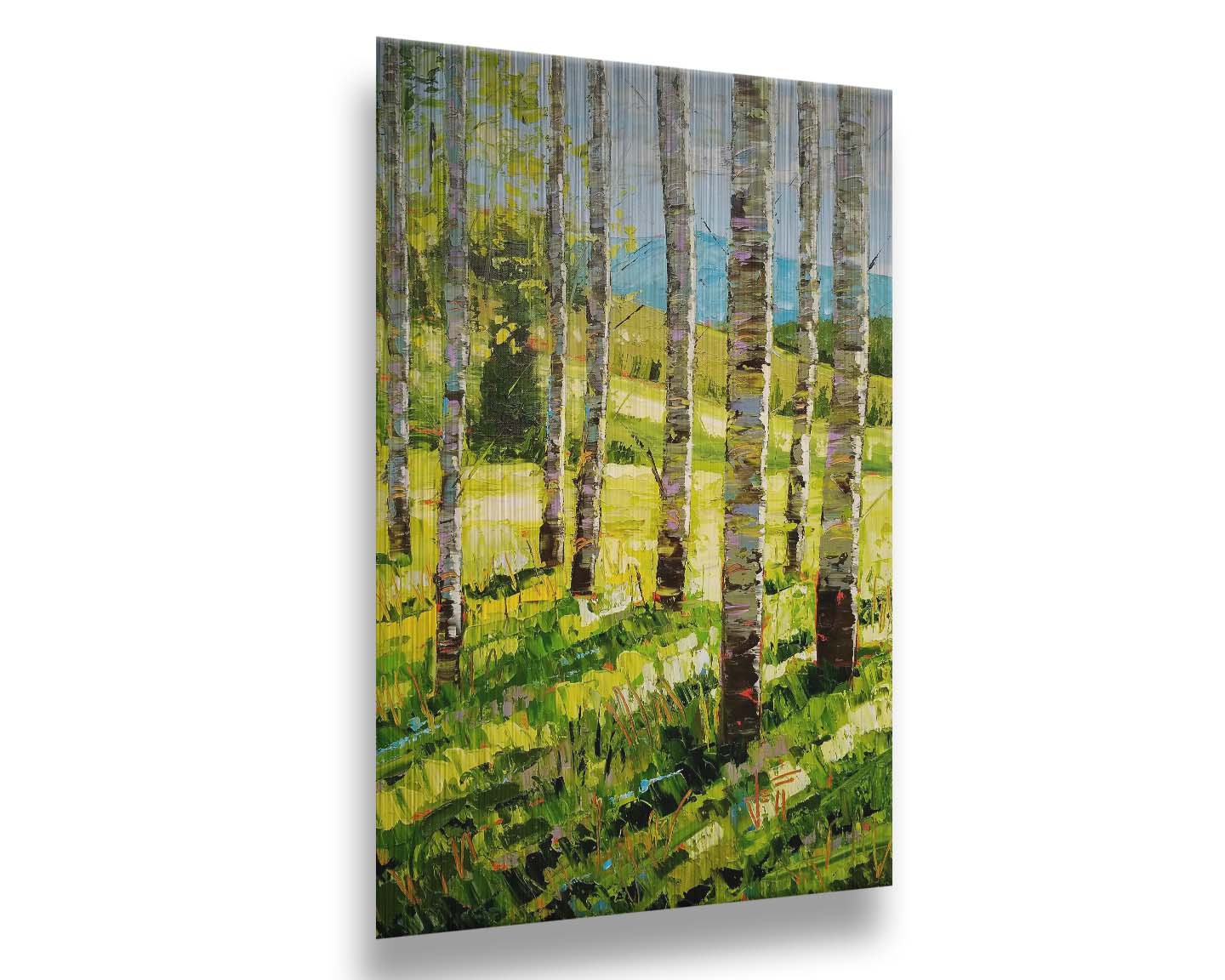 A painting of a group of birch tree trunks before a bright green grassy hill. Printed on metal.