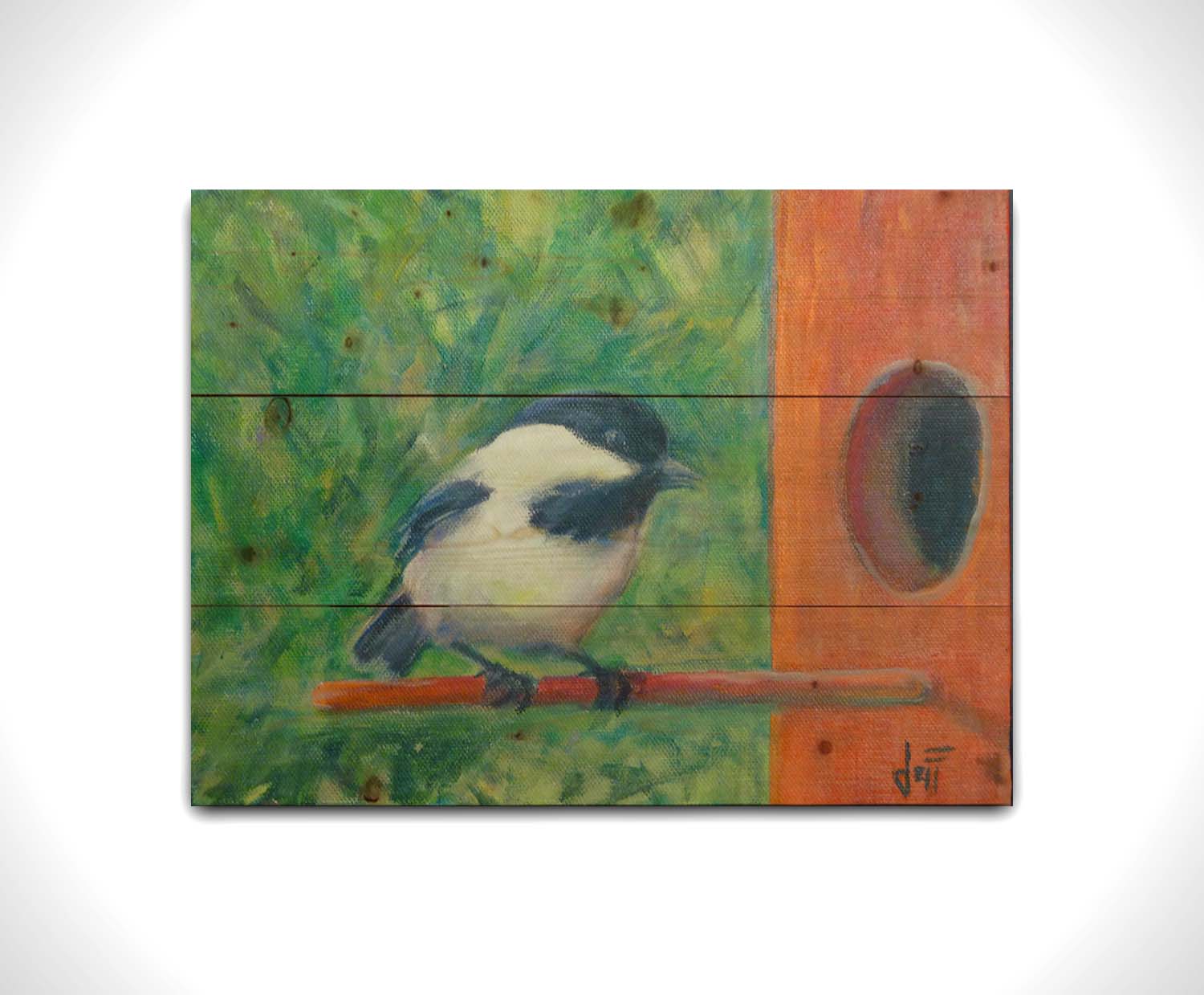 A painting of a black and white chickadee perched on an orange birdhouse, about to enter. The visible brushstrokes of the green background give the impression of foliage. Printed on a wood pallet.