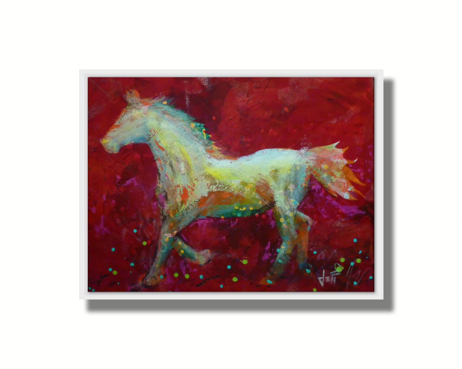 A painting of a colorful silhouette of a horse on a bold red background. Printed on canvas in a float frame.