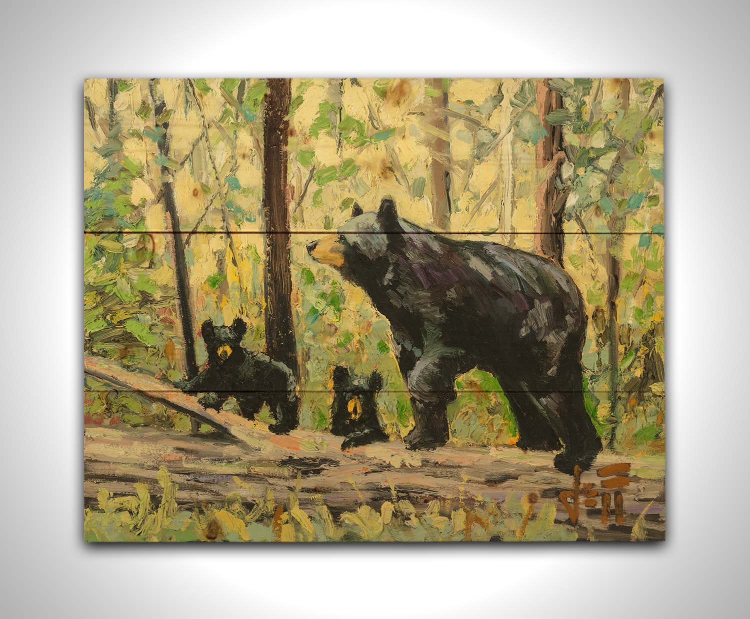 A painting of a family of three bears, walking through the forest over a log. Printed on a wood pallet.