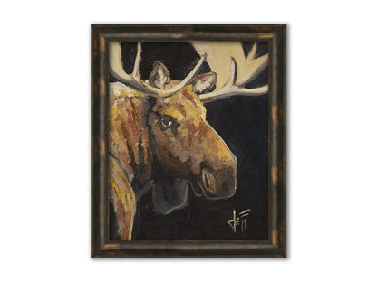 A closeup portrait painting of the face of a brown moose, in high contrast against a black background. Printed on canvas and framed.