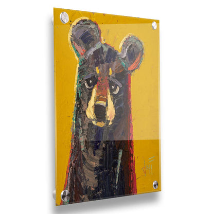 A portrait painting of a brown bear, accented with green and red, against a bright yellow background. Printed on acrylic.