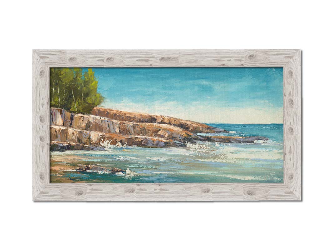 A landscape painting of the area of Lake Superior known as "Artist's Point". A rocky outcrop borders the water of the lake. Printed on canvas and framed.