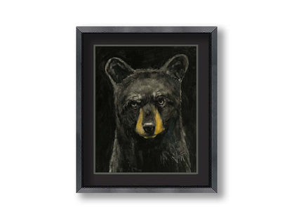 A portrait painting of a black bear against a black background. Printed on paper, matted, and framed.