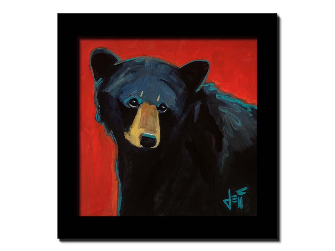 A painting of a black bear against a red background. Printed on canvas and framed.