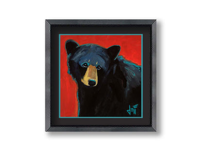 A painting of a black bear against a red background. Printed on paper, matted, and framed.