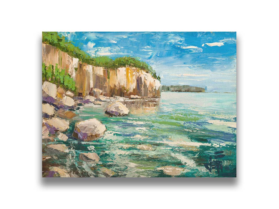 A painting of a rocky cliff overlooking clear waters on a sunny day. A vibrant green forest is growing on top of the cliffs. The teal water splashes against rocks on the shore. Printed on canvas.