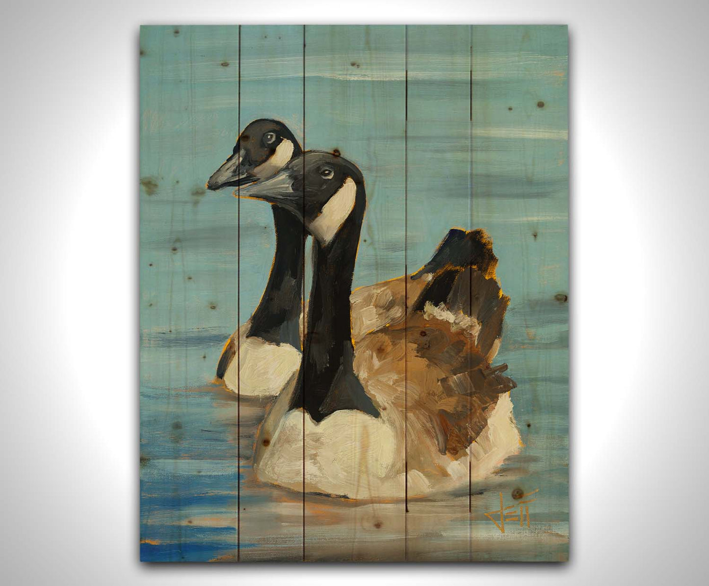 A painting of two Canadian geese swimming across smooth blue water. Printed on a wood pallet.