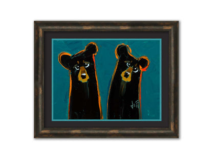 A painting of two black bears, abstracted into simplified shapes. They are outlined in bright orange, which contrasts the blue background. Printed on paper, matted, and framed.