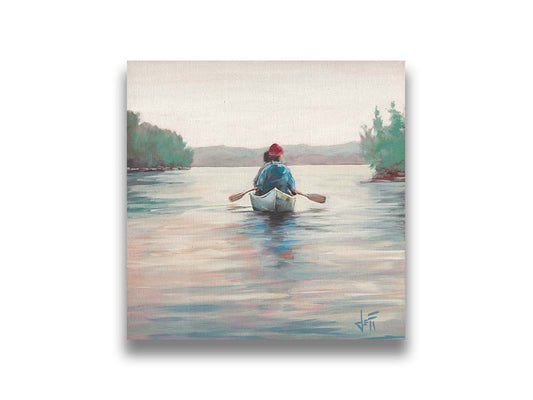 A painting of two people paddling a canoe across a lake in the early morning. The sky is pale reflecting on the water, and green trees line the shore along the lake. Printed on canvas.