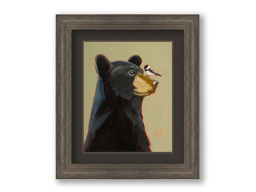 A portrait painting of a black bear, with a chickadee perched on its muzzle, set against a light brown background. Printed on paper, matted, and framed.