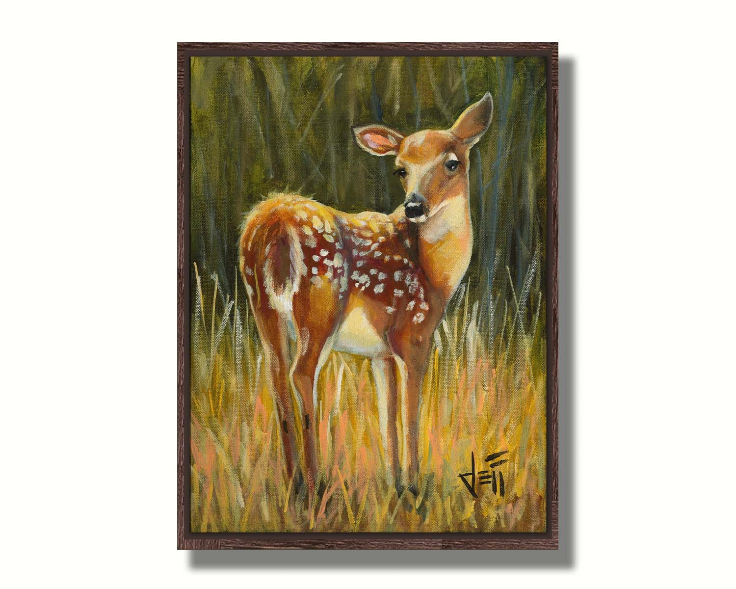 A painting of a baby deer, standing in a grassy field. before a green forest. Printed on canvas in a float frame.