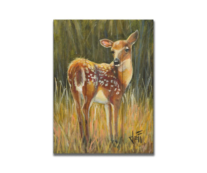 A painting of a baby deer, standing in a grassy field. before a green forest. Printed on a box board.