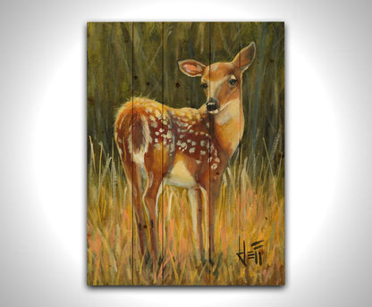 A painting of a baby deer, standing in a grassy field. before a green forest. Printed on a wood pallet.