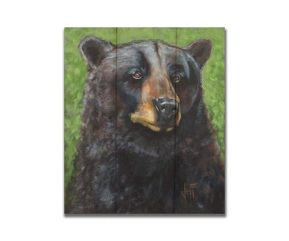 A portrait painting of a black bear against a green background. The texture and depth of the bear's fur is expertly depicted using variations in shade, tone, and texture. Printed on a box board.