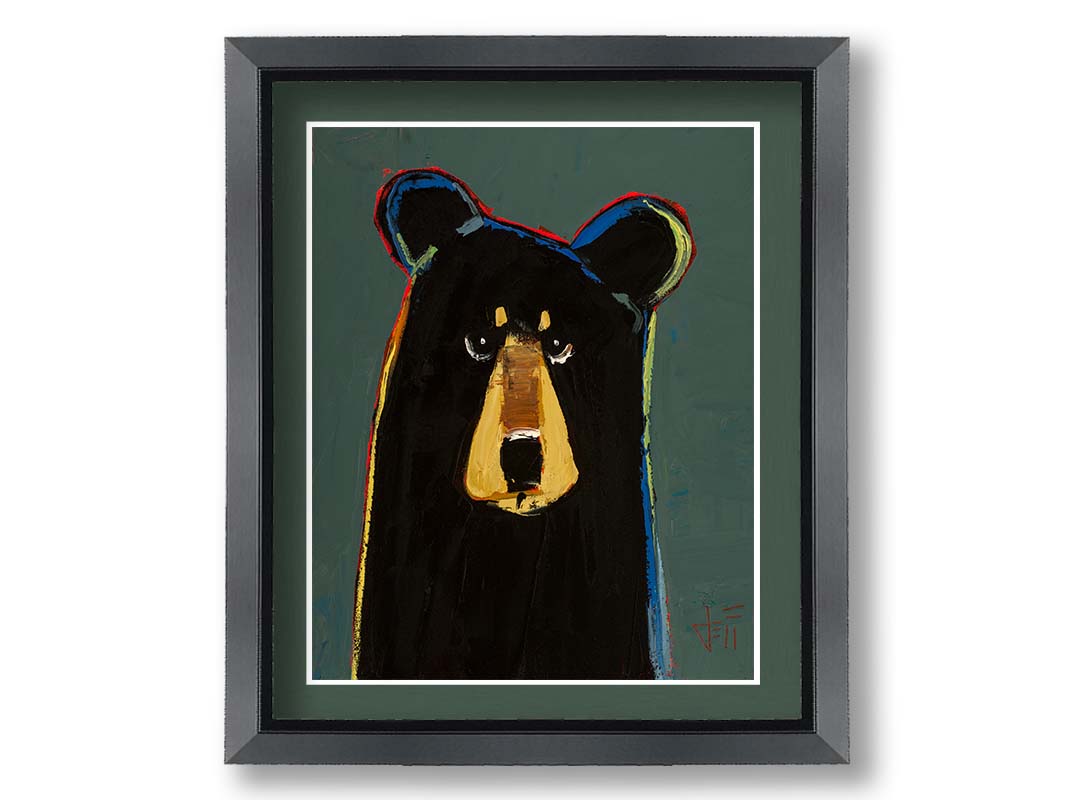 A portrait of a black bear in a simple style utilizing flat planes of color. It is outlined in red, orange, yellow, green, and blue, and set against a dusty green background. Printed on paper, matted, and framed.