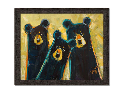 A painting of three black bears in a style utlizing simple shapes. They are outlined in blue and orange against a textured, desaturated yellow background. Printed on canvas and framed.