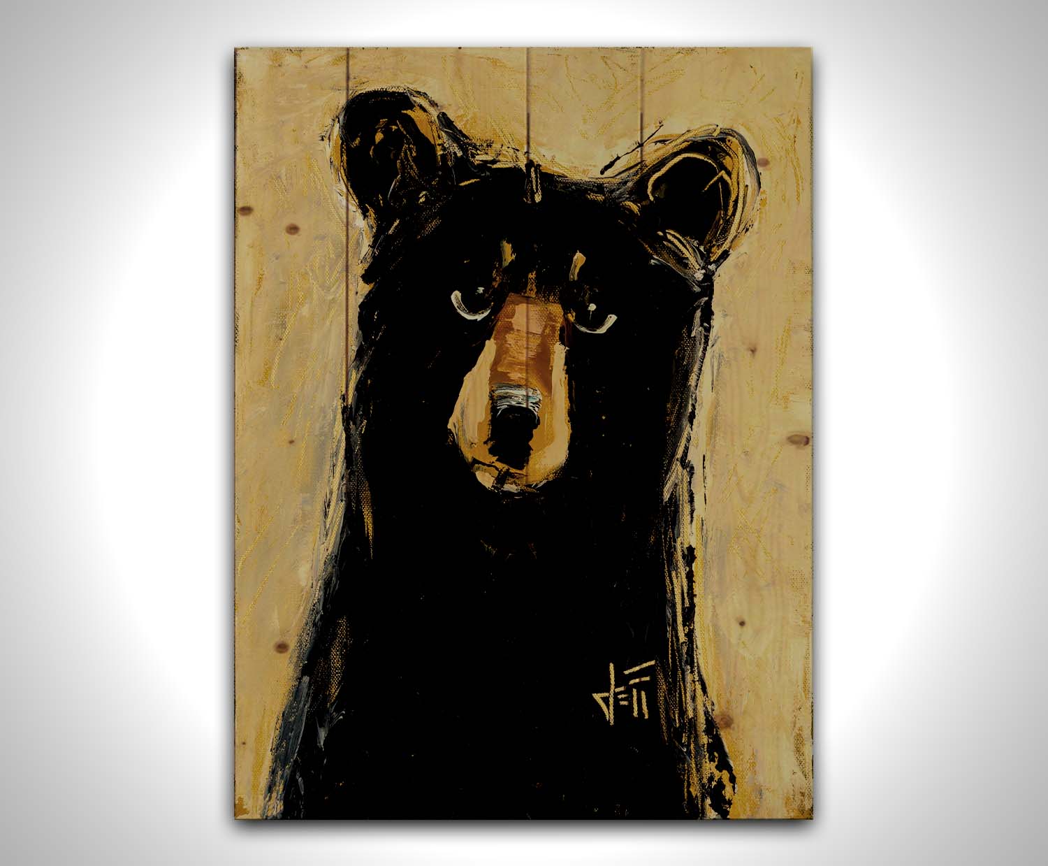 A stylized painting of a black bear against a muted yellow background. The use of flat colors emphasizes the shape of the bear, which is textured using visible brushstrokes to roughen the edges. Printed on a wood pallet.