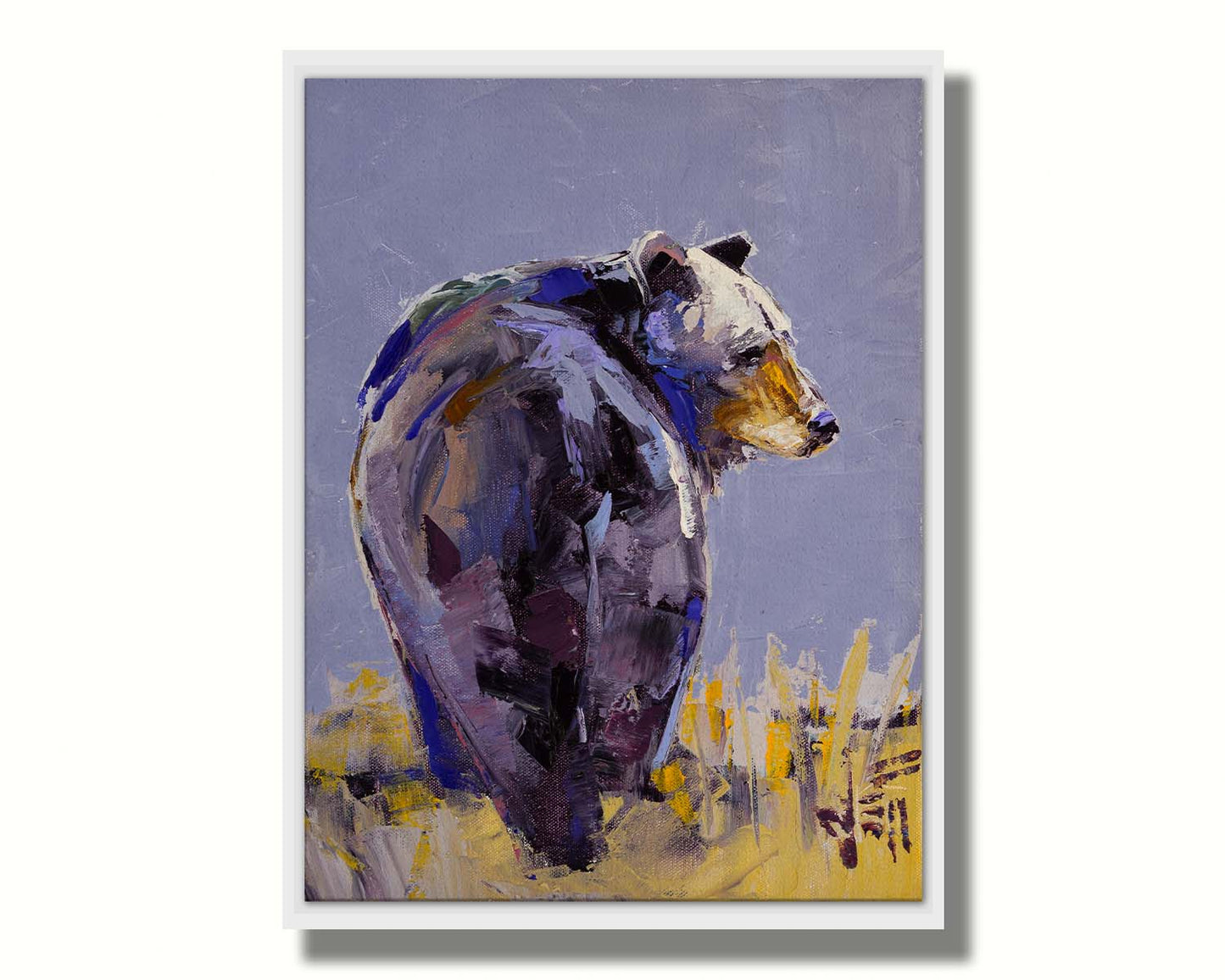 A painting of a black bear, painted in a gentle purple palette, standing in a grassy yellow field. Printed on canvas in a float frame.