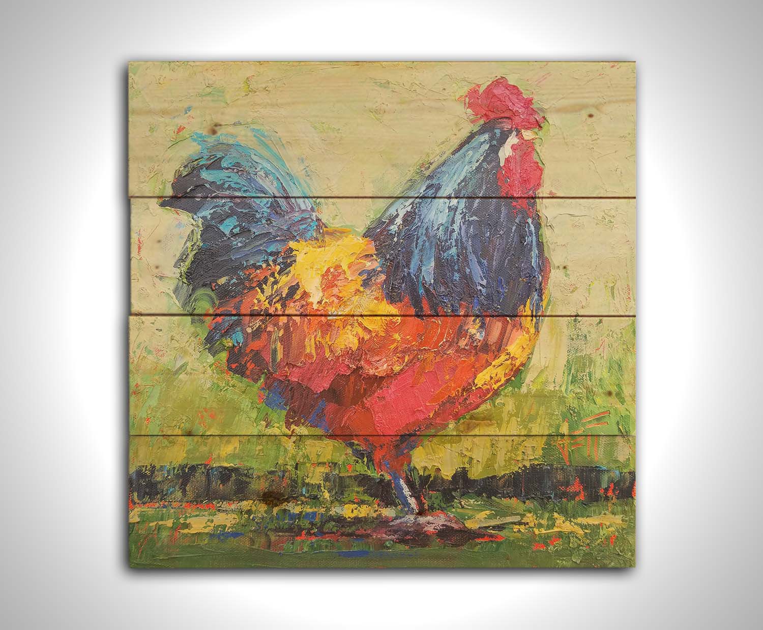 A painting of an orange and blue rooster in a green landscape. Printed on a wood pallet.