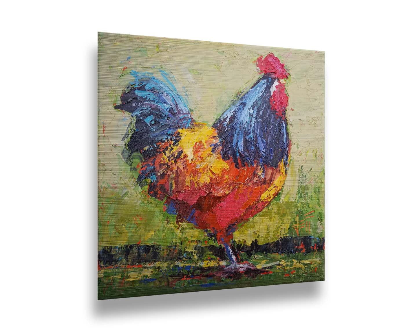 A painting of an orange and blue rooster in a green landscape. Printed on metal.