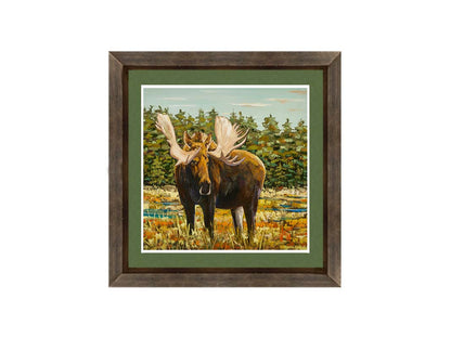 A painting of a moose standing in a bright yellow and orange field, dotted with blue puddles. An evergreen forest borders this Gunflint Trail field in Minnesota. Printed on paper, matted, and framed.