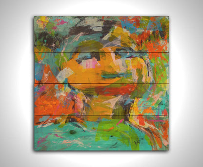 An expressive, abstracted painting of a figure. The lively colors and sporadic brushstrokes create a sense of motion within the composition. Printed on a wood pallet.