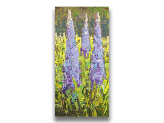 A painting of purple lupine flowers, standing tall against their bright green leaves. Printed on canvas.