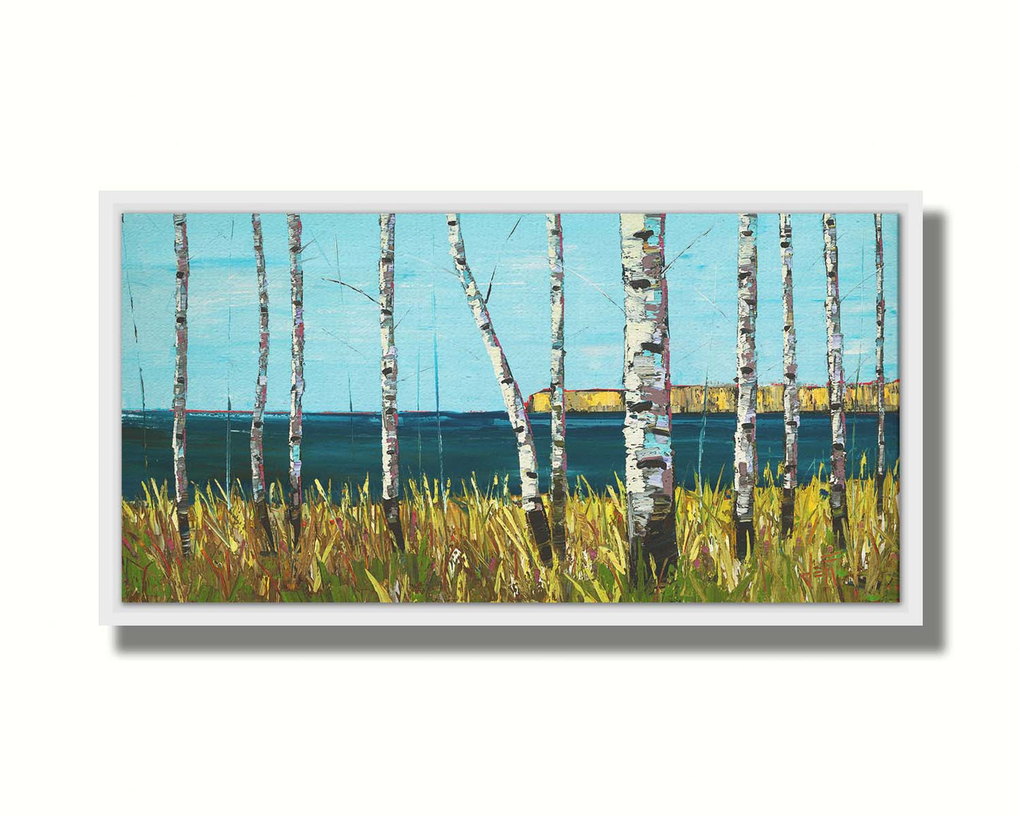 A painting of a serene cliff landscape with birch trees. A tranquil sea is in the background. Printed on canvas in a float frame.